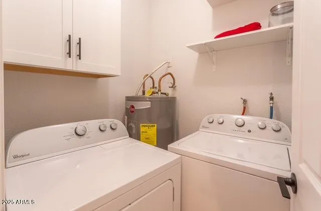 a living room with furniture a table and a large window