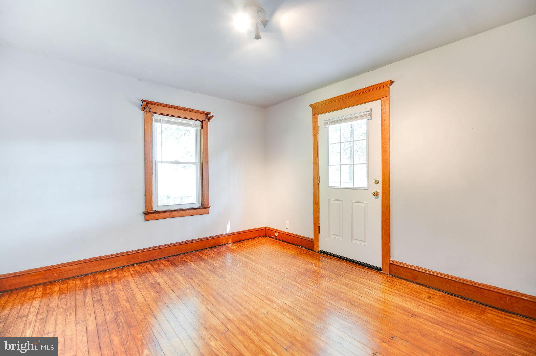 118 Spring Street Woodbury, NJ 08096 - Photo 5 of 22 1st Flr Bedroom/Family Room