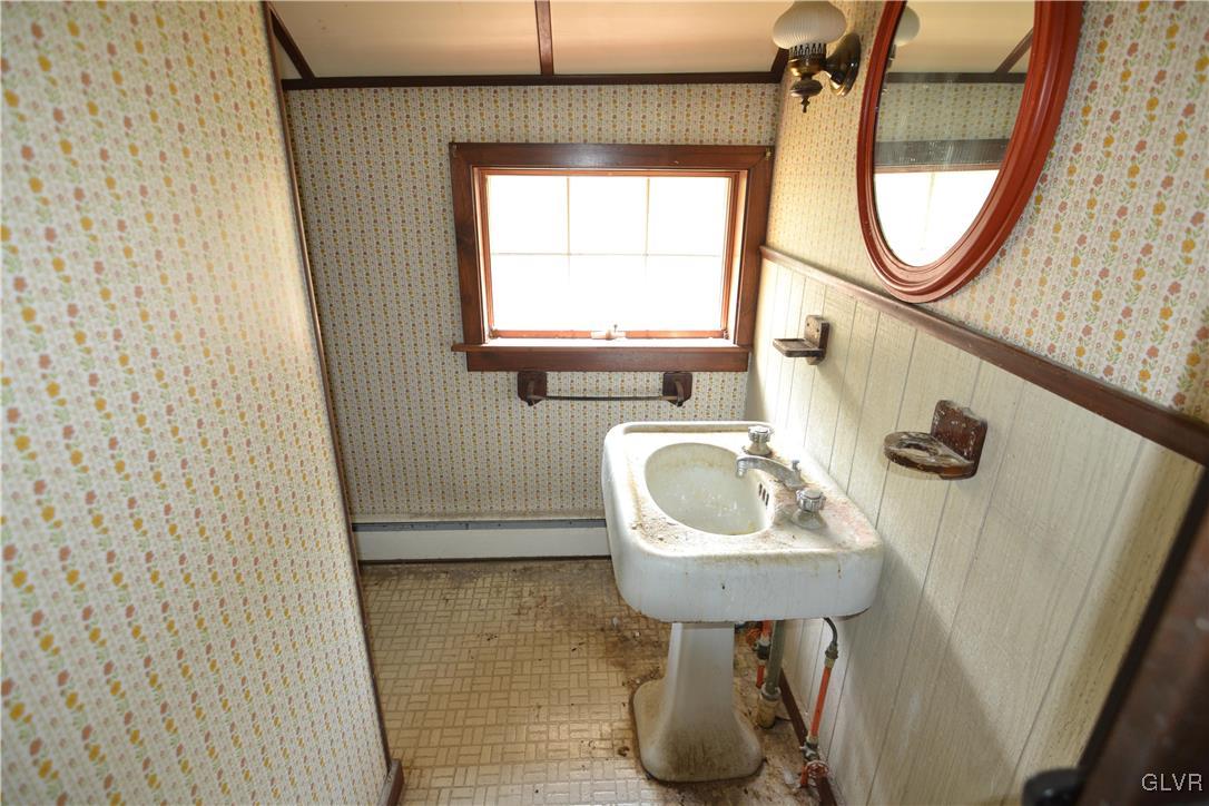 805 5 Points Richmond Road Bangor, PA 18013 - Photo 16 of 21 a bathroom with a sink toilet and a mirror