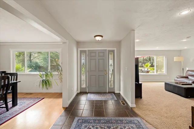 a living room with furniture and a couch