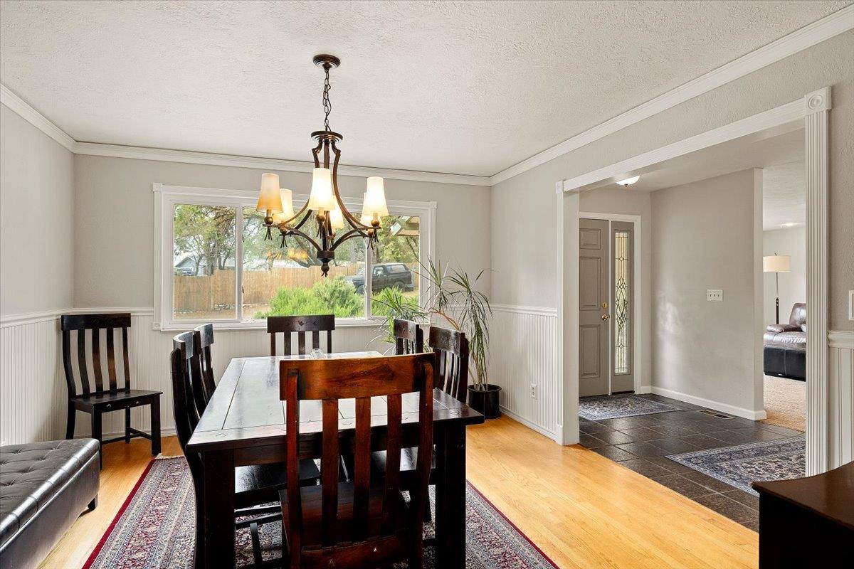 2540 Muir Court Cool, CA 95614 - Photo 17 of 97 a view of a dining room with furniture window and outside view