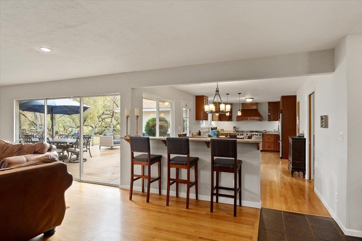 2540 Muir Court Cool, CA 95614 - Photo 26 of 97 a dining room with furniture and wooden floor