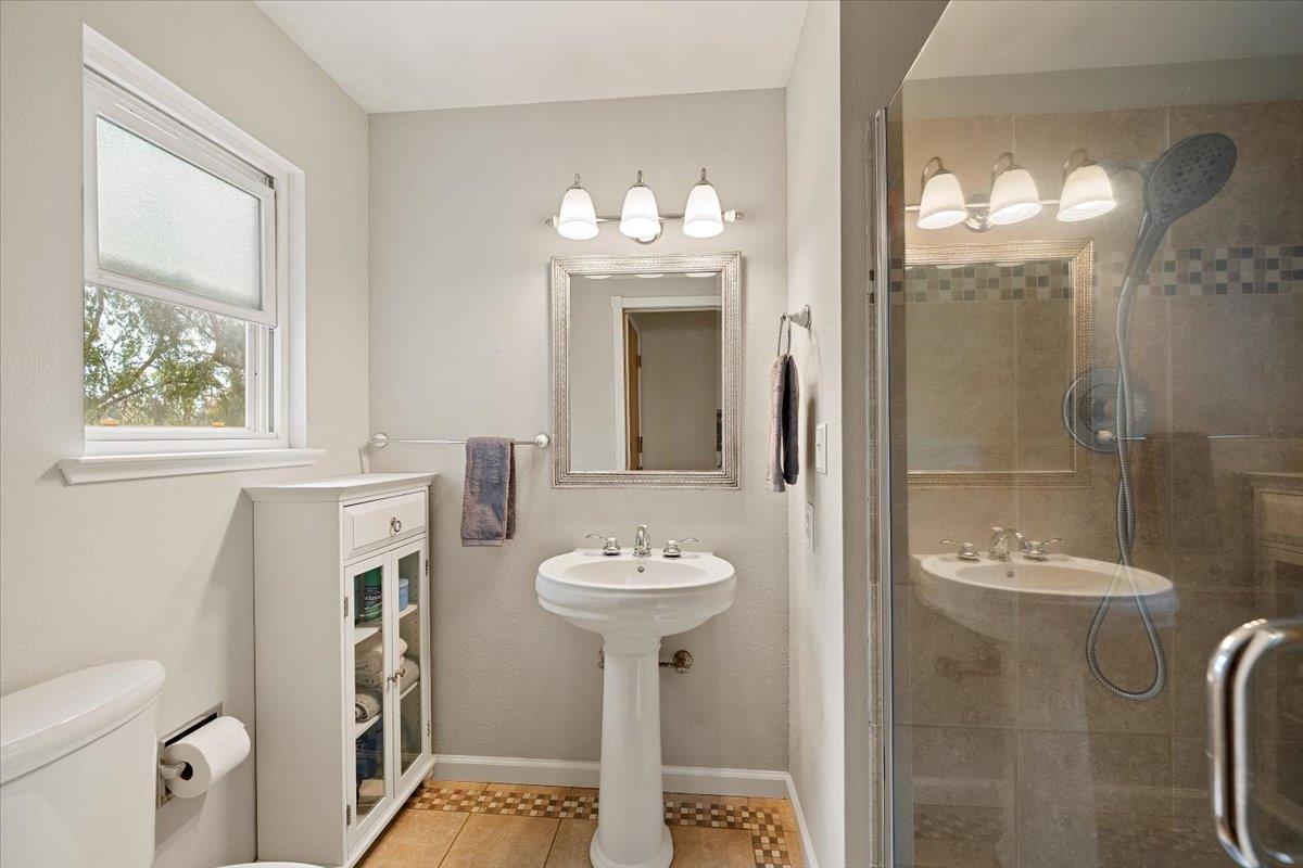 2540 Muir Court Cool, CA 95614 - Photo 31 of 97 a bathroom with a sink toilet and a mirror