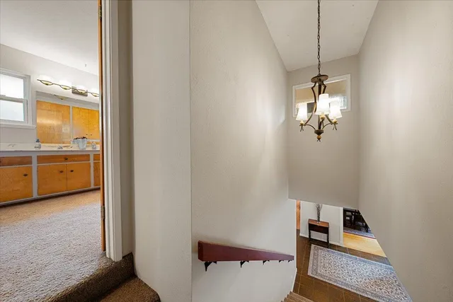 a view of a yard with snow on the road