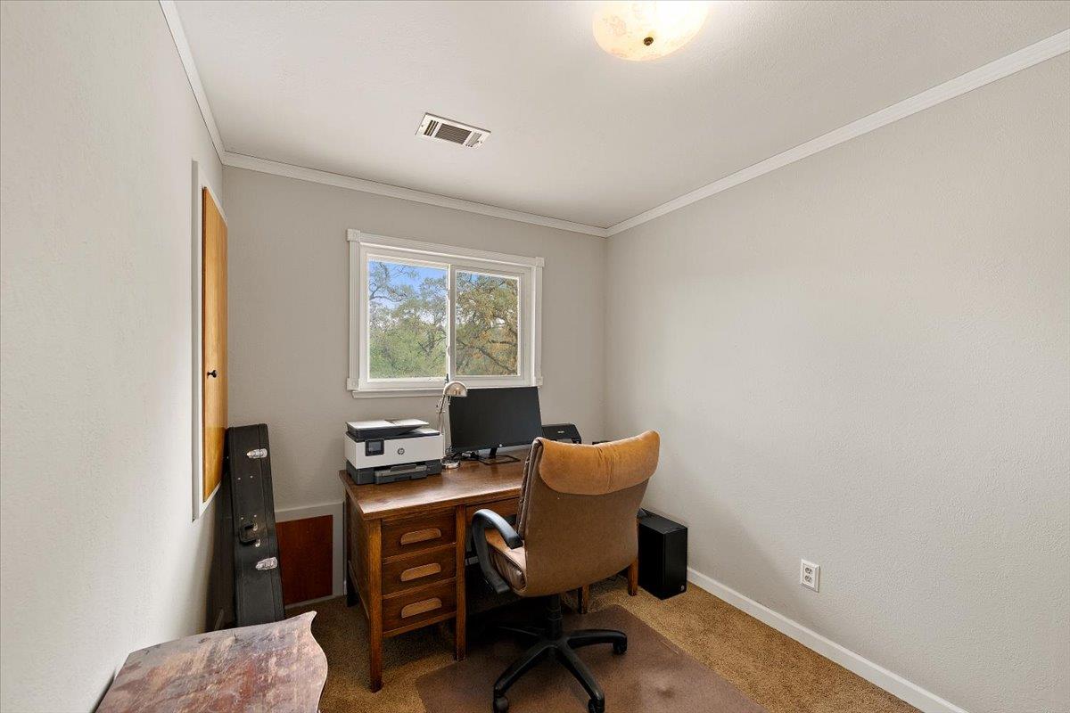 2540 Muir Court Cool, CA 95614 - Photo 42 of 97 a view of a workspace with furniture and a window