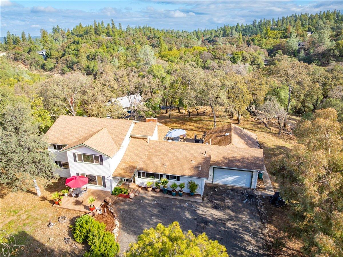 2540 Muir Court Cool, CA 95614 - Photo 88 of 97 view of subject property featuring a heavily wooded area