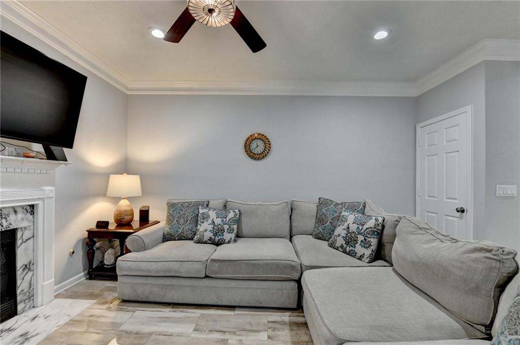 2066 Pinnacle Pointe Drive Norcross, GA 30071 - Photo 17 of 56 a living room with furniture and a flat screen tv