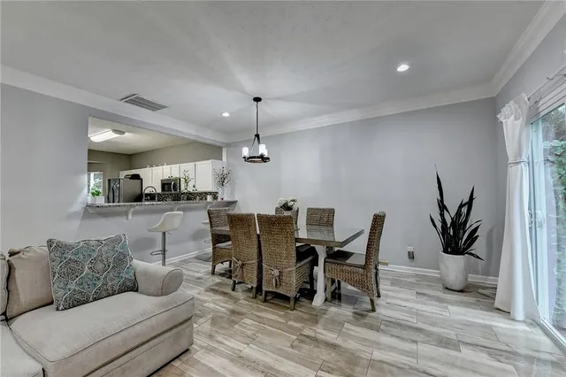 a view of a dining room with furniture
