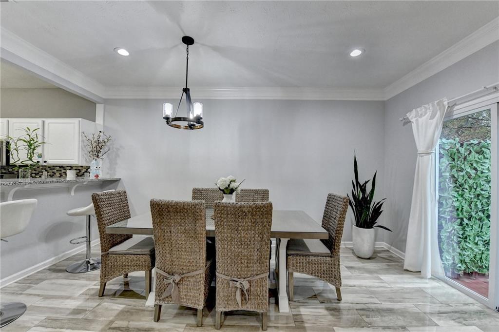 2066 Pinnacle Pointe Drive Norcross, GA 30071 - Photo 21 of 56 a dining room with furniture and window