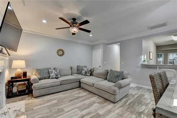a kitchen with a sink and a refrigerator
