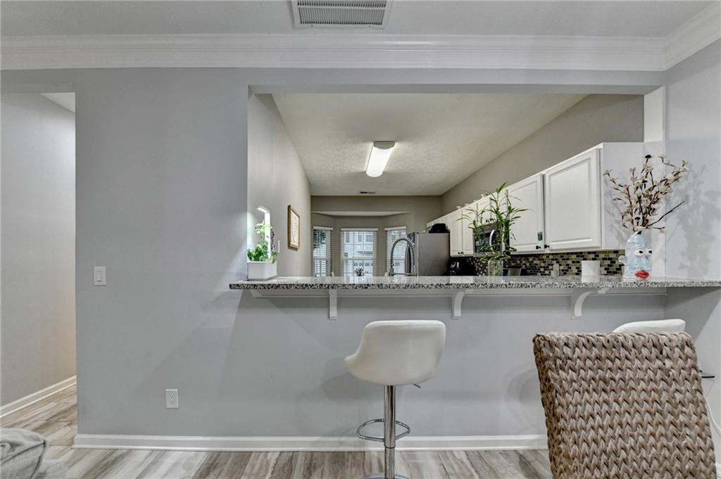2066 Pinnacle Pointe Drive Norcross, GA 30071 - Photo 28 of 56 a kitchen with a sink and a refrigerator