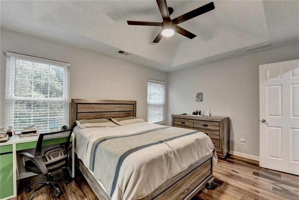 2066 Pinnacle Pointe Drive Norcross, GA 30071 - Photo 33 of 56 a bedroom with a bed and a large window