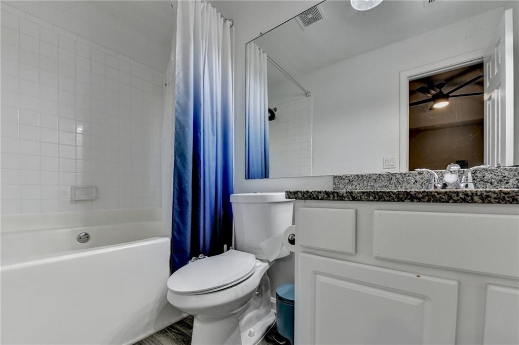 2066 Pinnacle Pointe Drive Norcross, GA 30071 - Photo 35 of 56 a bathroom with a sink toilet and shower