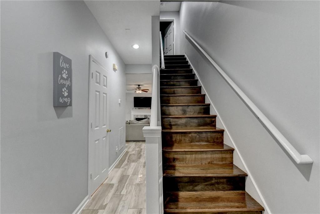 2066 Pinnacle Pointe Drive Norcross, GA 30071 - Photo 4 of 56 a view of entryway and gallery with wooden floor