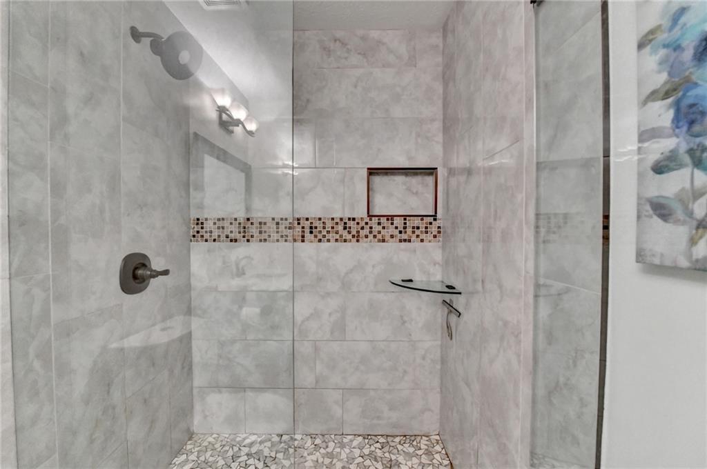 2066 Pinnacle Pointe Drive Norcross, GA 30071 - Photo 45 of 56 a bathroom with a shower