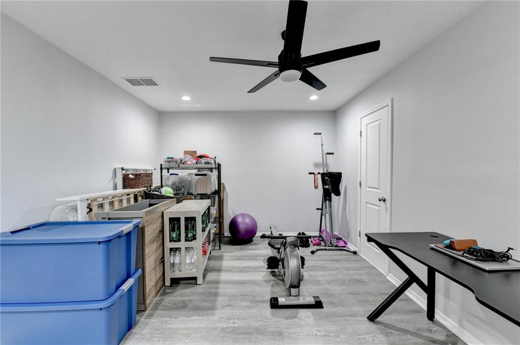 2066 Pinnacle Pointe Drive Norcross, GA 30071 - Photo 48 of 56 a room with gym equipment and equipment