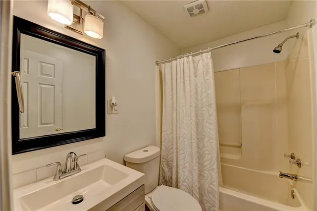 a view of a porch with a bench