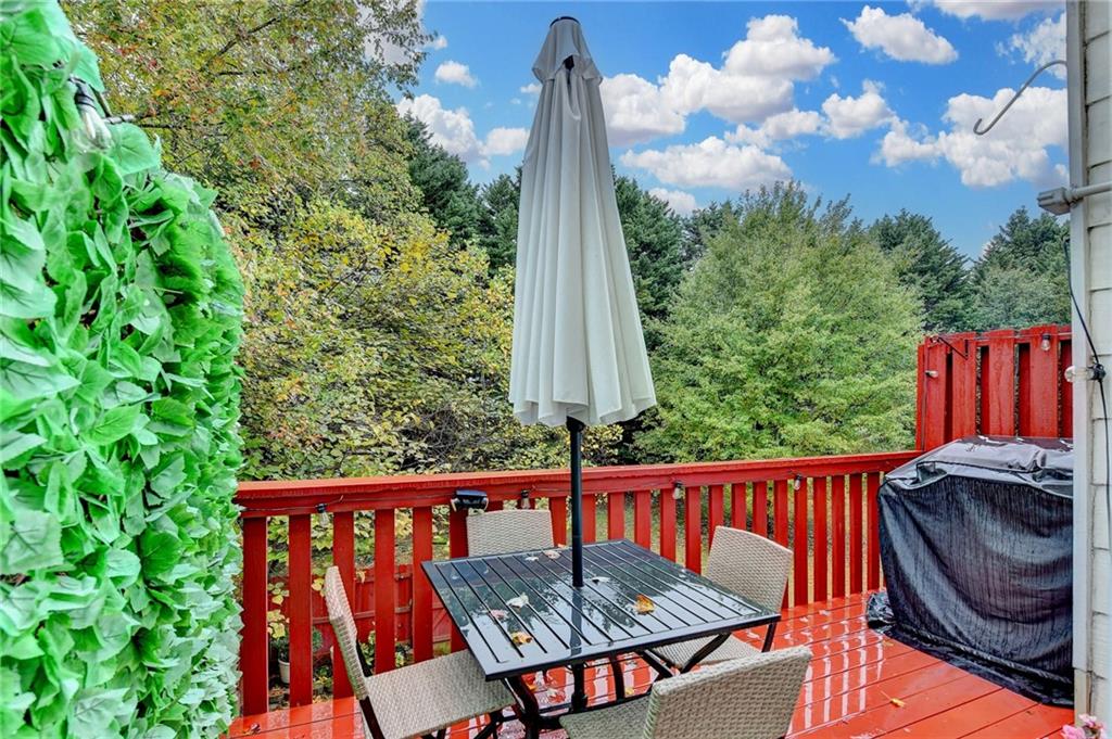 2066 Pinnacle Pointe Drive Norcross, GA 30071 - Photo 55 of 56 a view of a wooden chairs in patio of a house