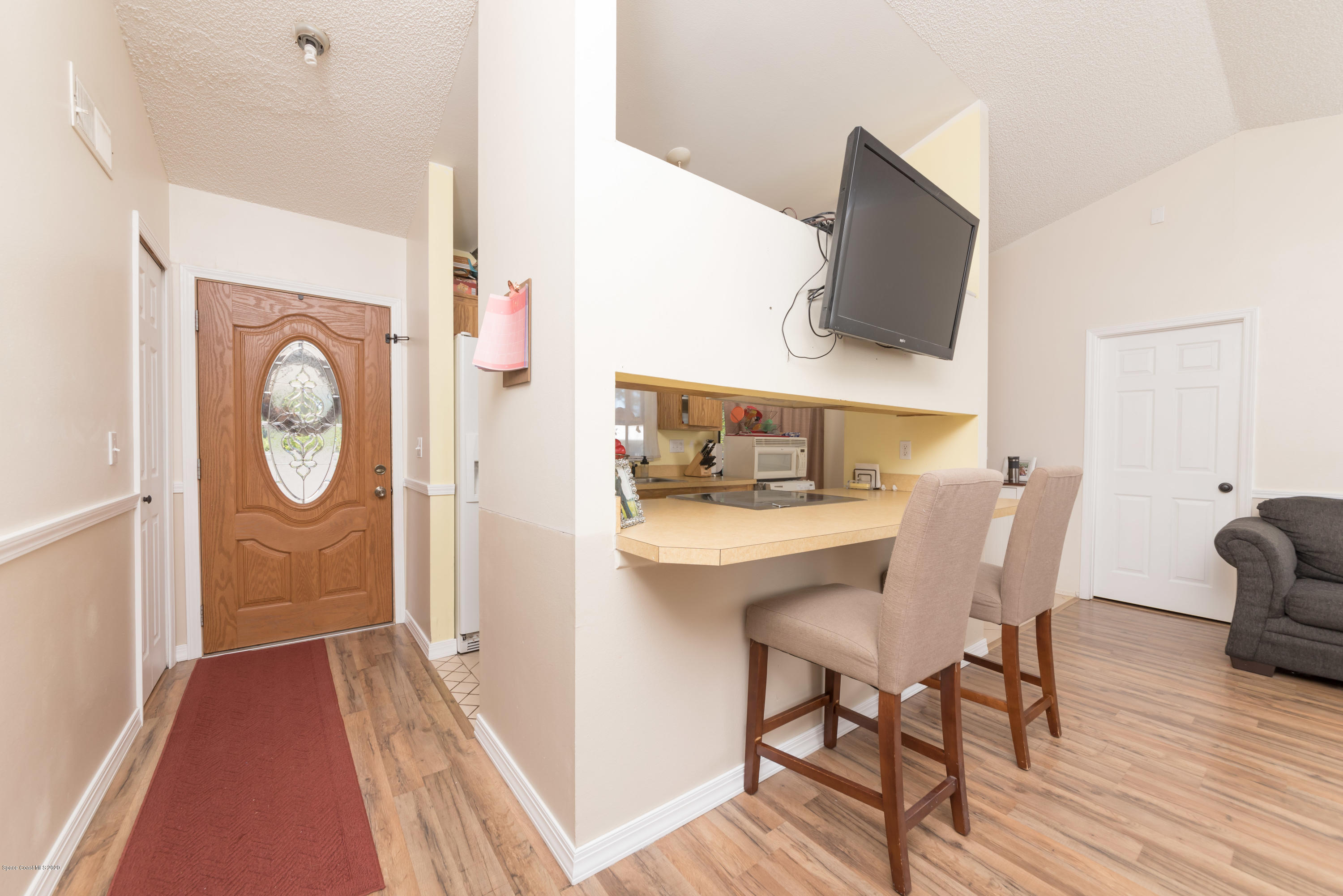 5170 Jamaica Road Cocoa, FL 32927 - Photo 4 of 15 View of Entry and Kitchen