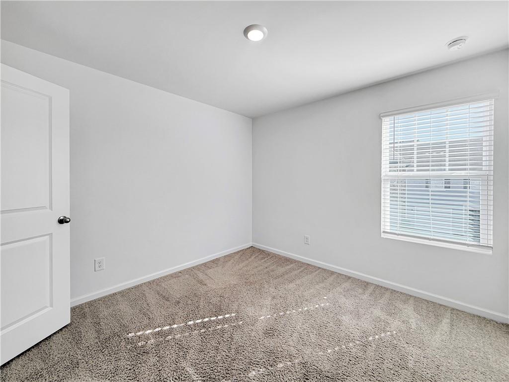 3523 Condor Court Atlanta, GA 30331 - Photo 16 of 23 an empty room with a window