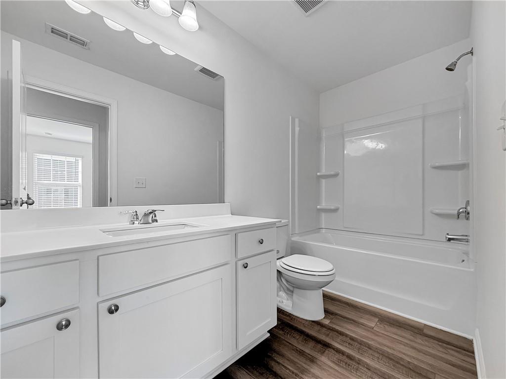 3523 Condor Court Atlanta, GA 30331 - Photo 17 of 23 a bathroom with a sink toilet tub and shower