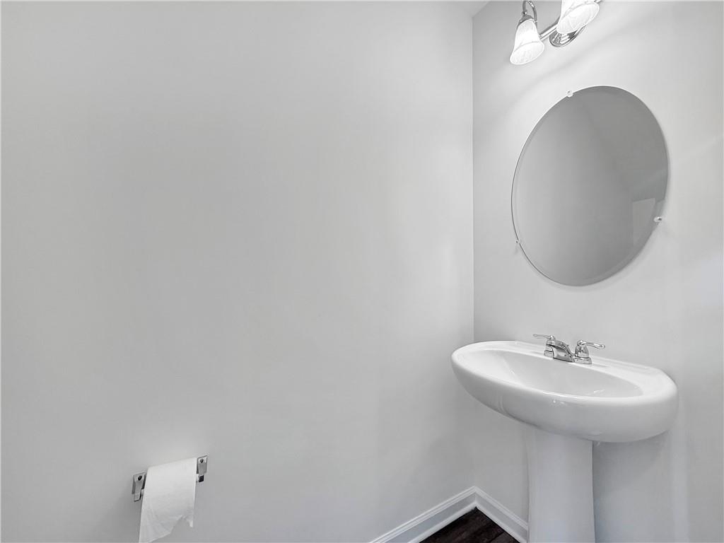 3523 Condor Court Atlanta, GA 30331 - Photo 5 of 23 a bathroom with a sink and a mirror