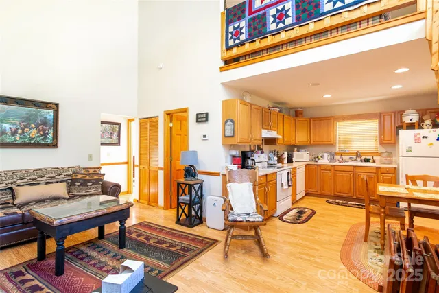 a living room with lots of furniture and a table