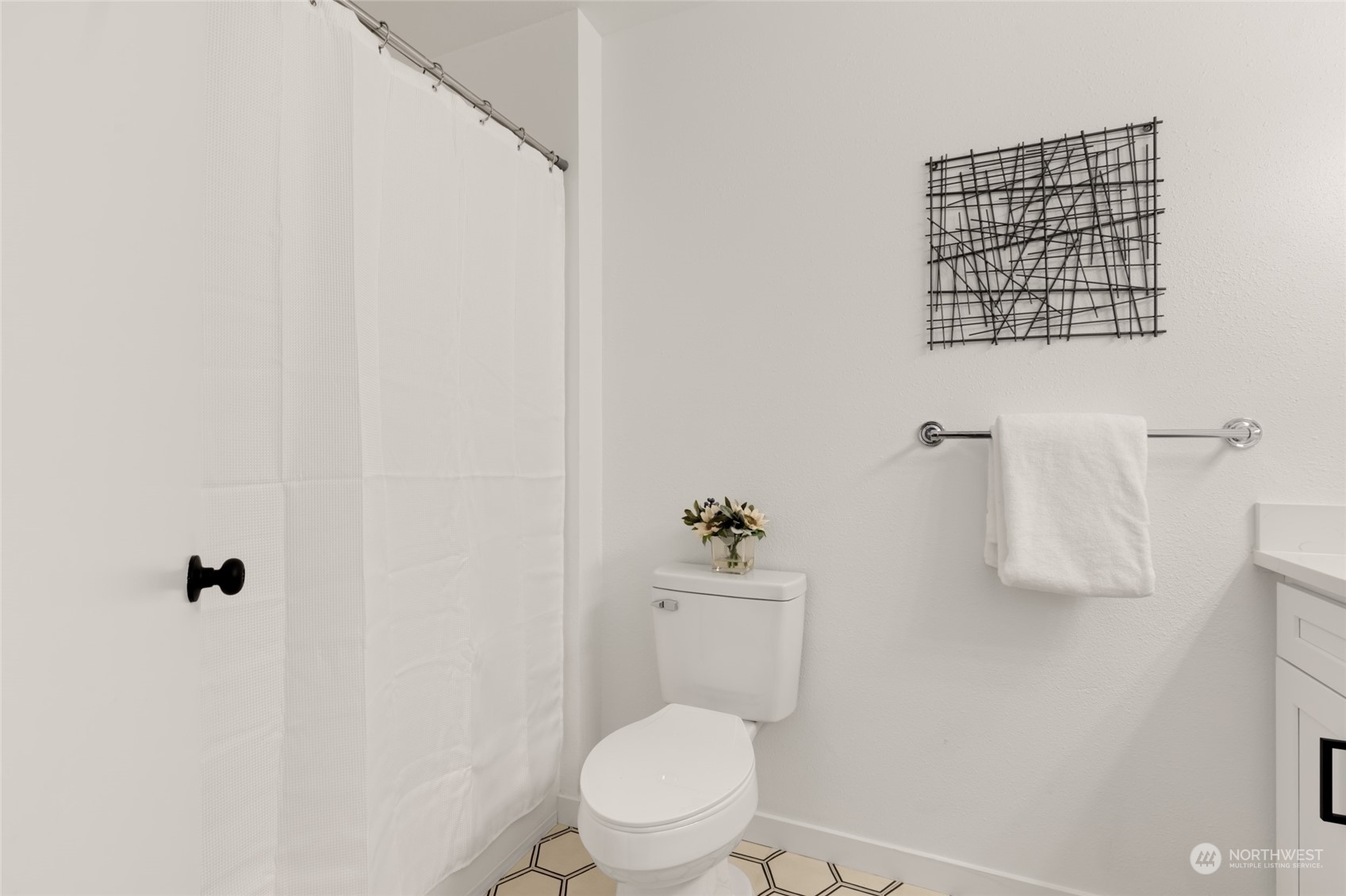 2409 180th Street Southeast Bothell, WA 98012 - Photo 20 of 40 a white toilet sitting next to a bathroom sink