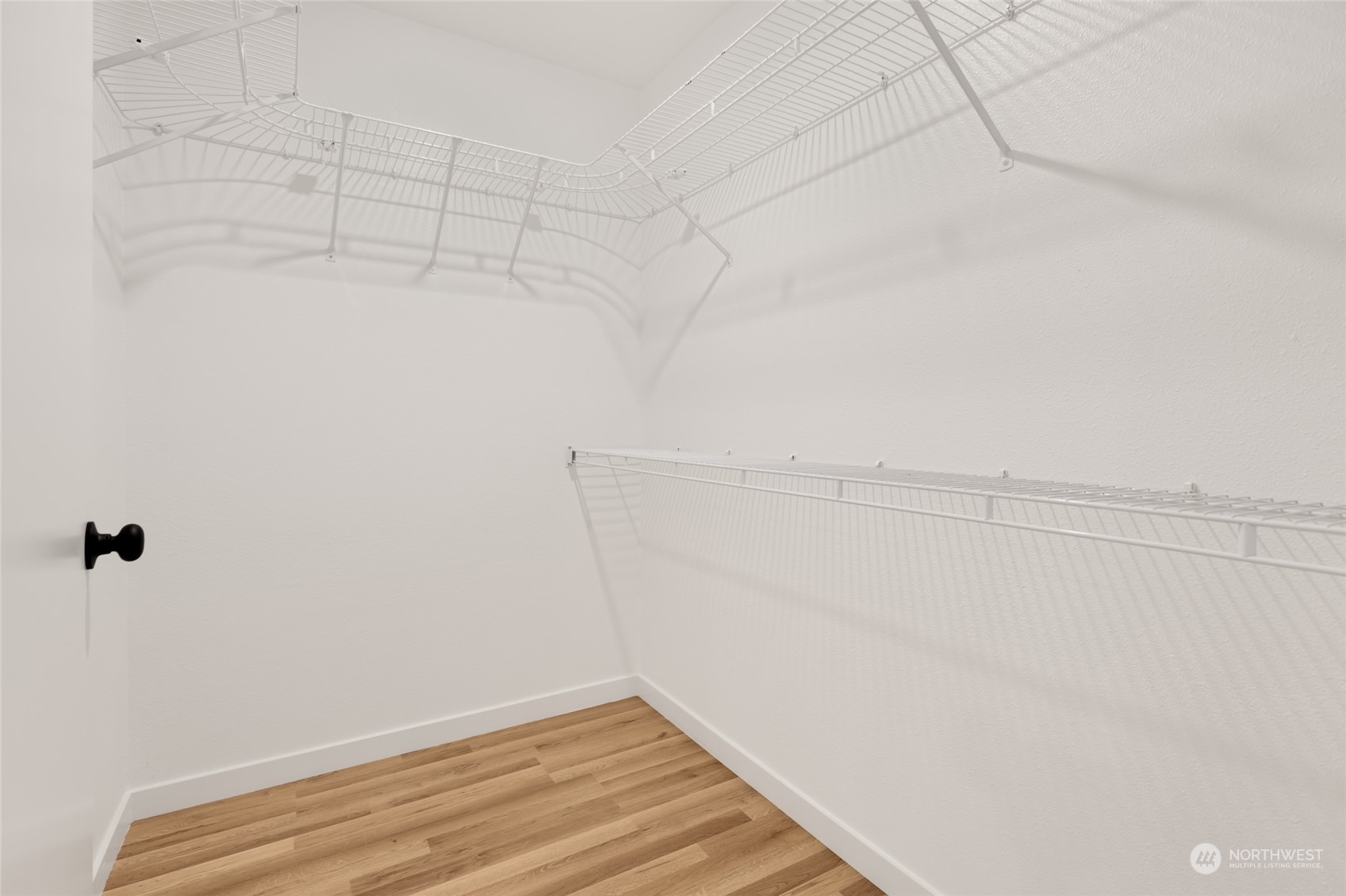 2409 180th Street Southeast Bothell, WA 98012 - Photo 21 of 40 a view of a room with racks on the wall