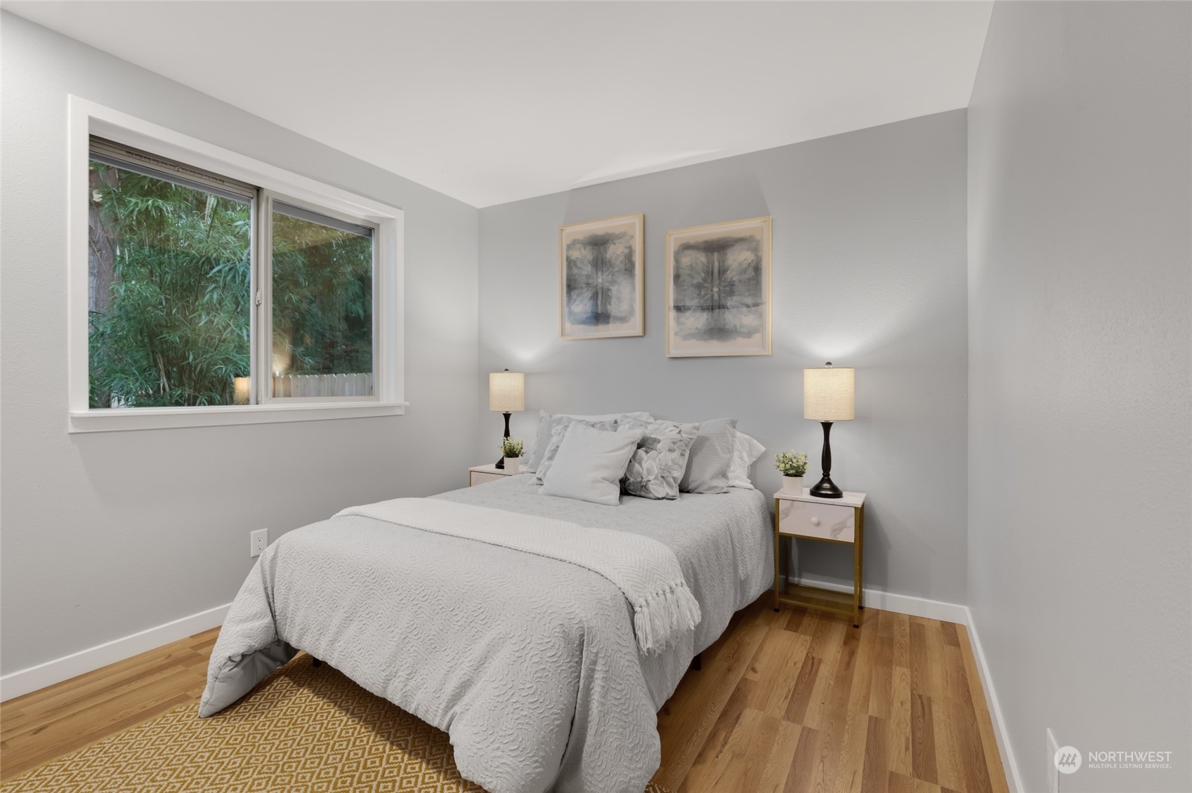 2409 180th Street Southeast Bothell, WA 98012 - Photo 22 of 40 a bedroom with a bed and a window
