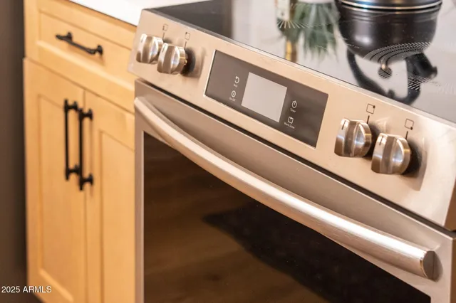 a bedroom with a bed and a lamp