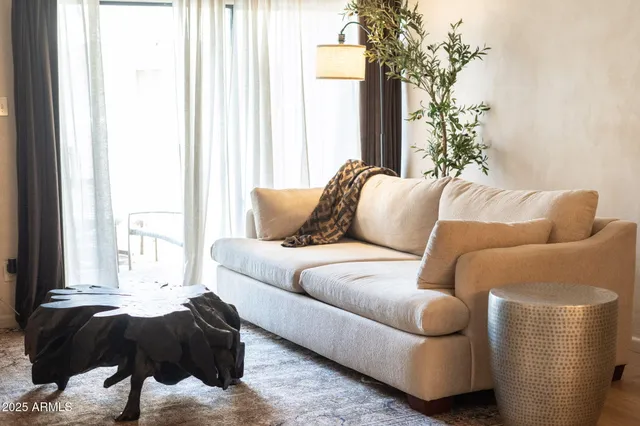 a picture of a room with a mirror and a fan