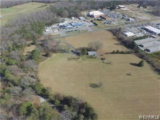 1990 Sandy Hook Road Goochland, VA 23063 - Photo 1 of 24 a view of water heater in a field