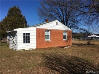 1990 Sandy Hook Road Goochland, VA 23063 - Photo 23 of 24 a front view of a house with a yard