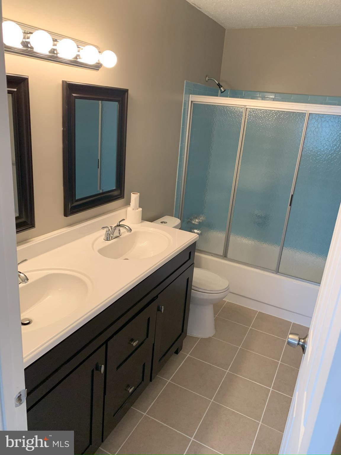 50 Georgetown Road Lindenwold, NJ 08021 - Photo 17 of 17 a bathroom with a sink a toilet and shower