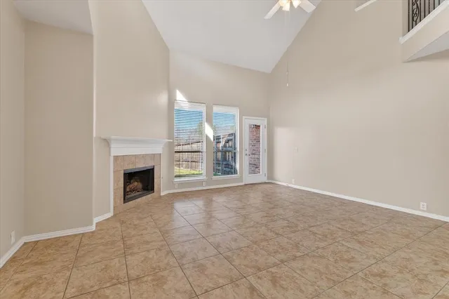a view of empty room with fireplace