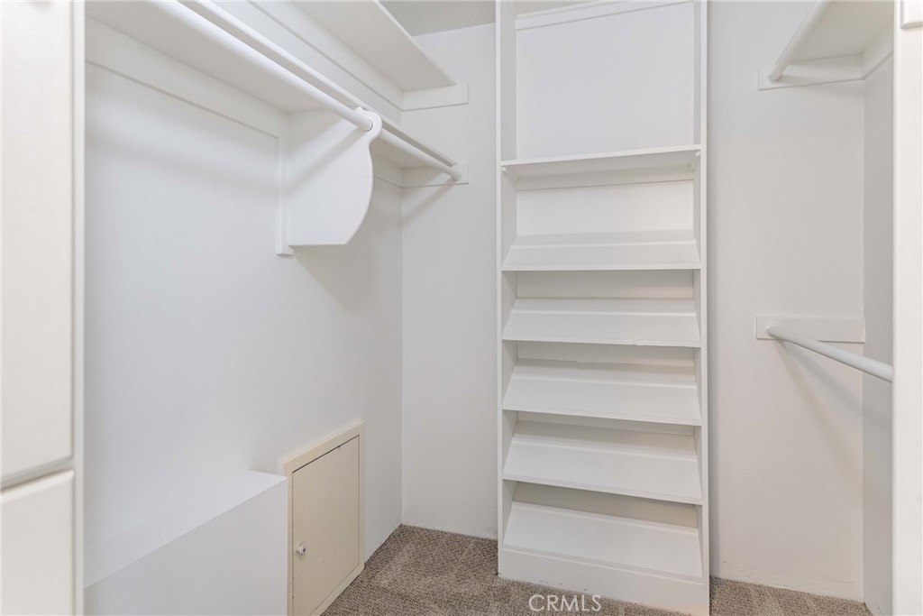 531 Esplanade, Unit 916 Redondo Beach, CA 90277 - Photo 27 of 41 a view of walk in closet with empty racks
