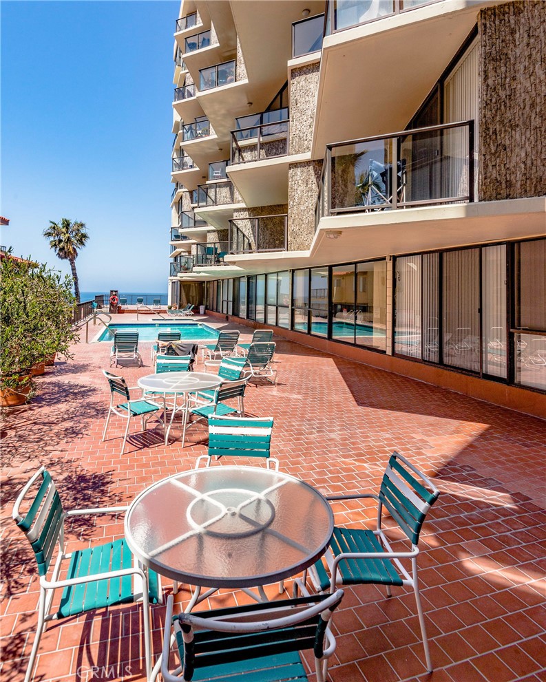 531 Esplanade, Unit 916 Redondo Beach, CA 90277 - Photo 30 of 41 an outdoor space with lounge chairs