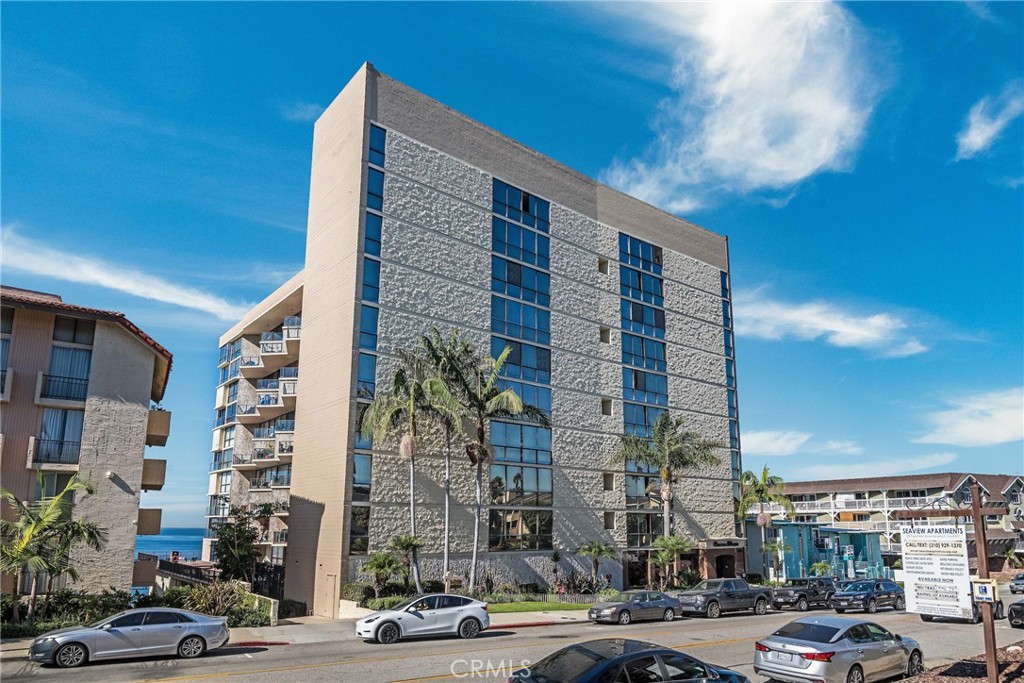 531 Esplanade, Unit 916 Redondo Beach, CA 90277 - Photo 38 of 41 a tall building sitting on the side of a street