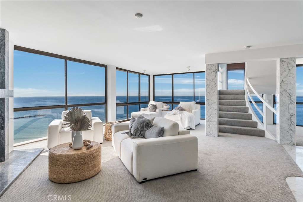 531 Esplanade, Unit 916 Redondo Beach, CA 90277 - Photo 5 of 41 a living room with furniture and a large window
