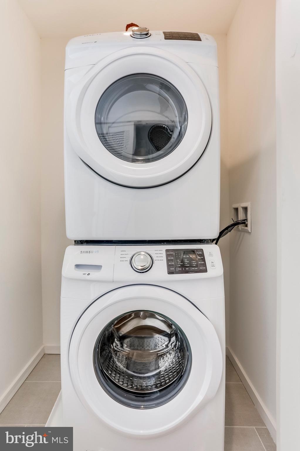 53 R Street Northeast, Unit 2 Washington, DC 20002 - Photo 23 of 25 a utility room with dryer and washer