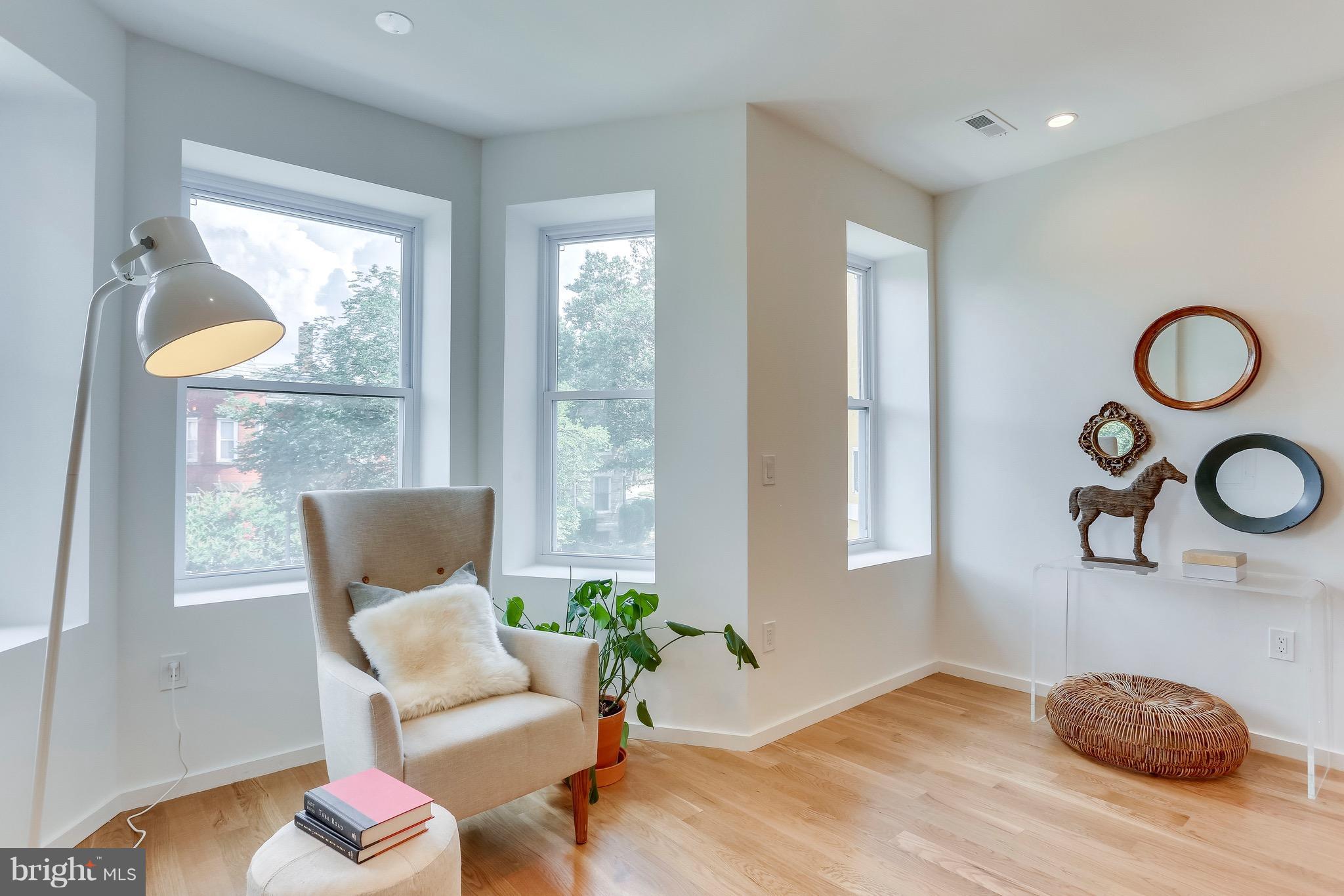 53 R Street Northeast, Unit 2 Washington, DC 20002 - Photo 10 of 25 a living room with furniture and window