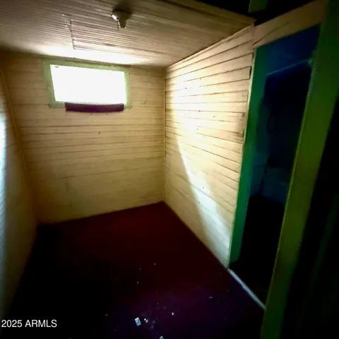 a view of water heater with wooden door
