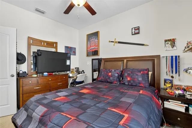 a view of house with a large windows next to a road