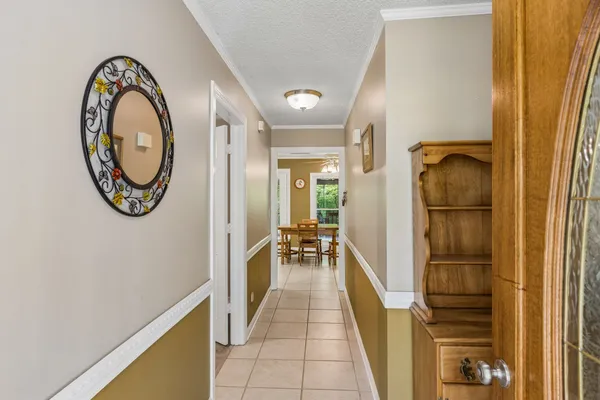 a hallway with wooden floor