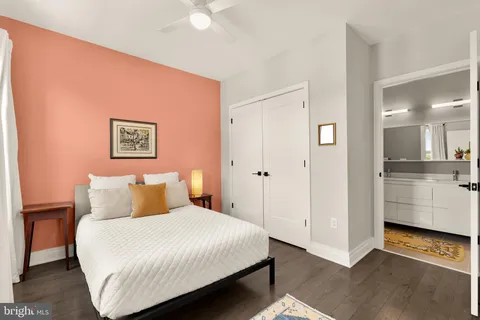 a bedroom with a bed and a view of bathroom