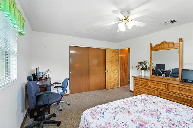 a bathroom with a sink a mirror and a shower