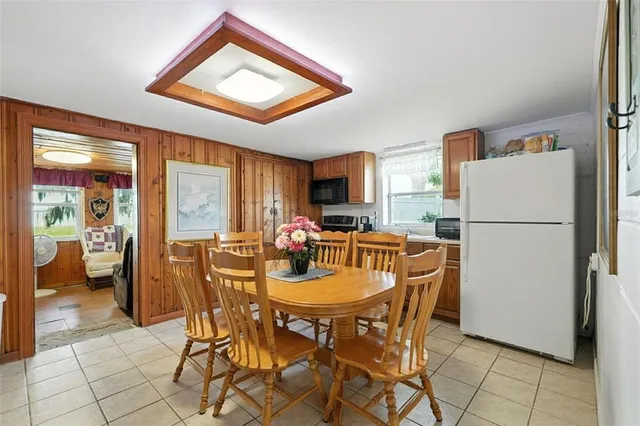 a bedroom with a bed and a desk