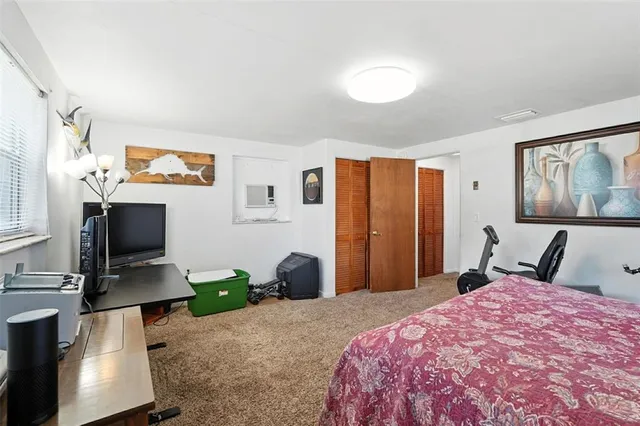 a white toilet sitting next to a bathroom sink
