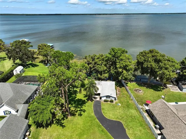 a view of a balcony with two chairs